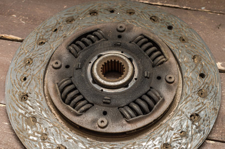 Disassembled clutch disc of a car in a car service repair shopの写真素材