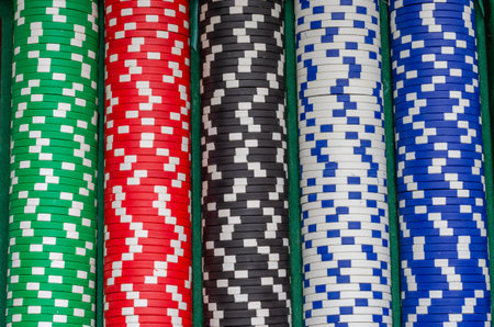 Colorful casino chips background. Close up shot of casino chips.の写真素材