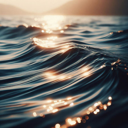 Sunset in the sea with waves and bokeh effect.の素材