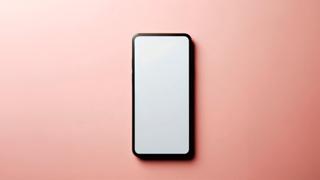 Smartphone with blank white screen on pink background, top view.の素材