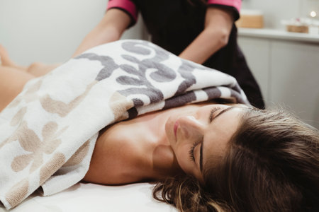 relax massege og a girl in beauty centerの写真素材