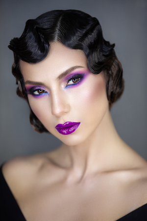 1920 1930 stylization beauty portrait of a young girl of the modern era hairstyle Finger wave make-up color smooky eseys i vinil lipsの写真素材