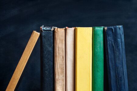 Old books on the chlakboard background. Learning concept. Copy spaceの写真素材