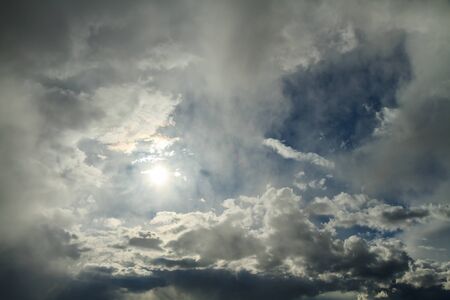 The light of the sun breaks through the clouds