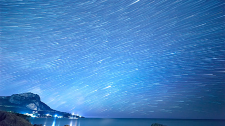 Star tracks over the sea. Time Lapseの写真素材