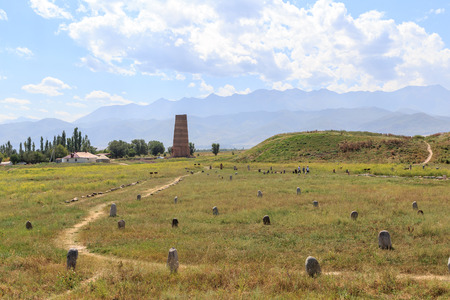 Burana tower (XI century) and the ancient stone sculptures of the peoples of Central Asia. Kyrgyzstanの写真素材
