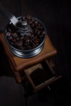 Upside view of grinding coffee grainsの写真素材