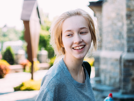 Cheerful girl in the city.
