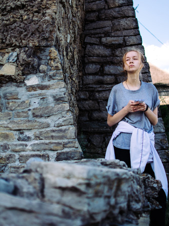 Beautiful caucasian woman using smartphone outdoorの写真素材