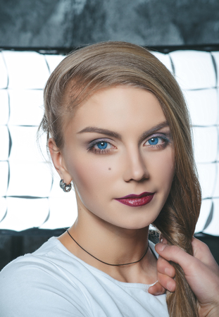 Portrait of young model. Fashion style. Model with blue eyes.の写真素材