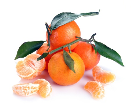 clementines with segments on a white backgrounの写真素材