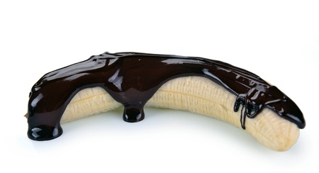  banana with pouring chocolateの写真素材