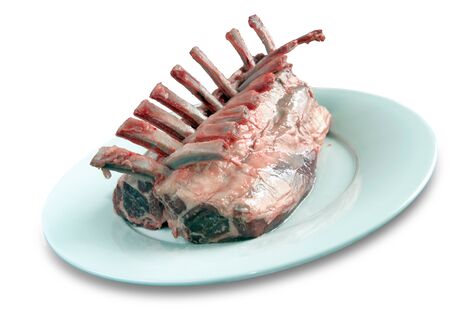 rack of lamb on a white plateの写真素材
