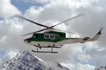 Rescue helicopter in the sky above the Alpsのeditorial素材