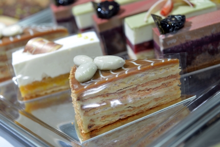 set of cakes with berries on the table