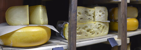 variety of cheeses at the grocery store
