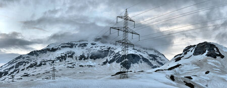High voltage electric power line in the foregroundの写真素材
