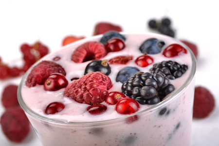 berry yogurt with berries in a glassの写真素材