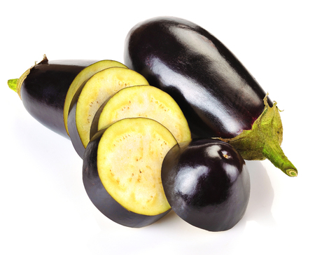 aubergine and slices on a white backgroundの写真素材