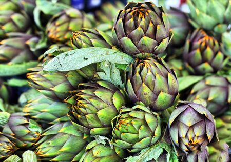 Pile of Artichoke on display at a farmers marketの写真素材