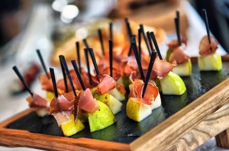 Catering service. Restaurant table with food at event. Shallow depth of viewの写真素材