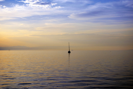 View of the lake on Lake Geneva on a cloudless dayの写真素材