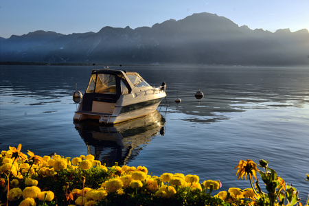 Switzerland Montreux view of Lake Geneva and the Alps in cloudy weatherの写真素材