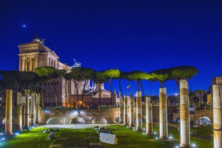 Roman Forum Ruins at Night. Ancient Government Buildings in the Center of Rome, Italy.の写真素材
