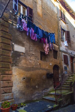 Beautiful Italian street of a small old provincial townの写真素材