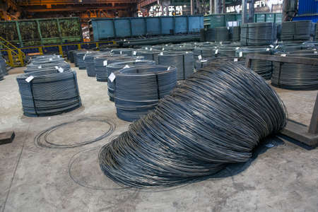 Steel sheets rolled up into rolls. Export Steel. Packing of steel for transportation.