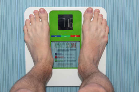 Legs men on the scalesの写真素材