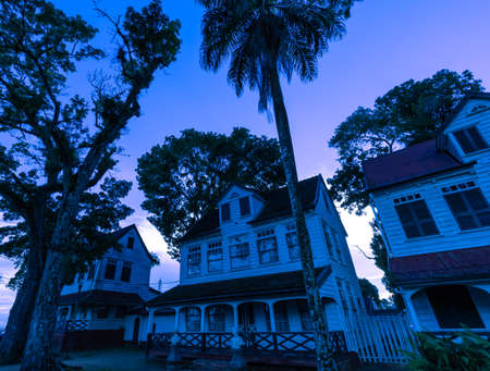 Paramaribo, Suriname - August 2019: Mystical Sunset At Blue Hour With Dutch Colonial Architecture.のeditorial素材