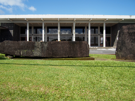 The historic Naha stone in front of the Hilo Public Library in Hawaii is believed to be what King Kamehameha lifted to fulfill prophecy.のeditorial素材