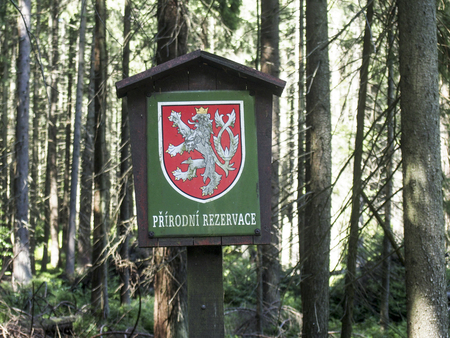 A sign in a nature preserve in Celada near the border of Slovakia and the Czech Republic.の写真素材