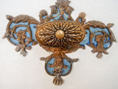 Detail of a decorative doorknob with blue and copper color.の写真素材