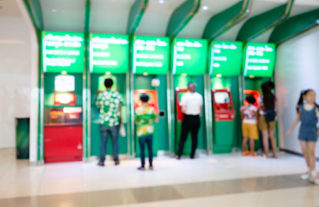 Abstract blur background, People are using financial transactions at ATMs, money cash, ATM machineの写真素材