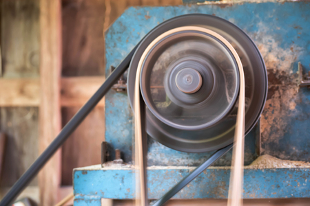 Old machine with belt industry is working with copy space.の写真素材