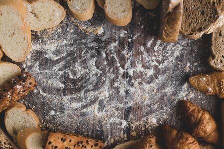 Bread and pastry powder on a wooden table and space for text input