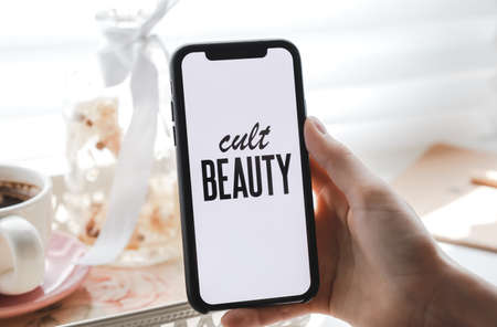 Cult Beauty shop logo on the iPhone screen. ... High quality photoのeditorial素材