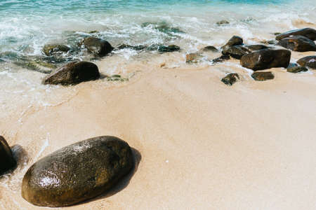 Sea waves wash the stones on the shore. Tropical vacation. High quality photoの写真素材