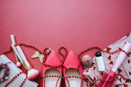Fashion women accessories on the pink pastel background. Sale concept, flat lay. High quality photo