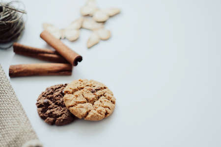 Homemade oatmeal cookies with cinnamon on white background. Healthy Food Snack. High quality photoの写真素材