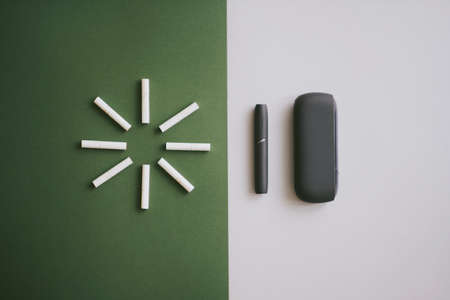 Heating tobacco system IQOS with heat sticks, iqos tobacco product technologies. High quality photoのeditorial素材