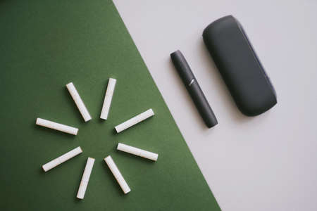 Heating tobacco system IQOS with heat sticks, iqos tobacco product technologies. High quality photoのeditorial素材