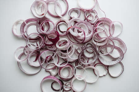 Red onion rings isolated on a white background. Close up. Cooking concept. High quality photoの写真素材