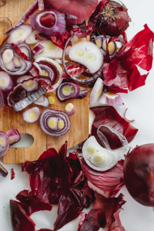 Red onion rings on a wooden board. Close up. Cooking concept. High quality photo