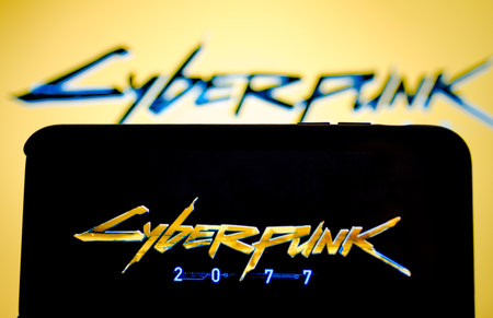 Smartphone with the CyberPunk 2077 logo on the screen. The most anticipated game of 2020.