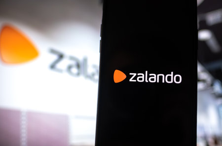 Zalando shop logo on the smartphone screen. Copy space.のeditorial素材