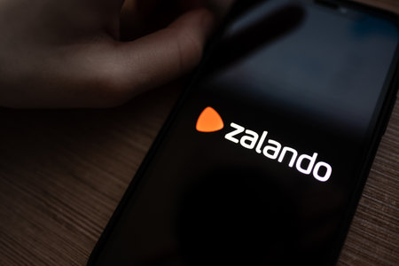 Zalando shop logo on the smartphone screen. High quality photoのeditorial素材