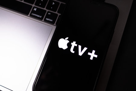 Apple TV plus logo on smartphone screen. High quality photo.のeditorial素材